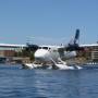 A floatplane taxi's through the harbour before take-off