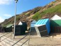 Beach huts blown over by the gales, Southbourne