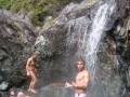 Sebastian and CJ enjoying the heated waterfall. Bizarrely colder at one end, and hotter the other!